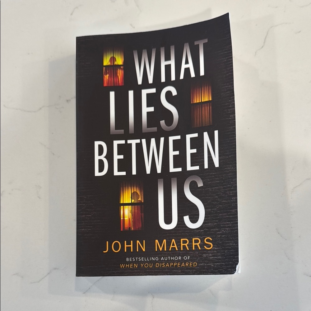 What Lies Between Us by John Marrs
